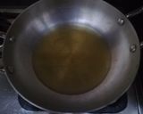 A picture of step 1 of Chicken Karhai.