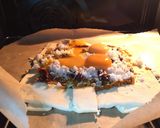 A picture of step 4 of Eggs And Coconut On SunDried Pesto Top Parmesan Puff Pizza.