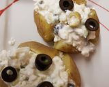 A picture of step 4 of Cottage cheese and pineapple jacket potatoes 😊.