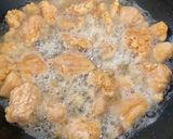 A picture of step 2 of Saucy Crispy chicken with rice fries and vegetable.