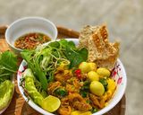 A picture of step 4 of Mi Quang with Chicken and Quail Eggs.