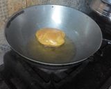 A picture of step 14 of Gujrati masala puri with aloo sabji.