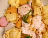 A picture of step 1 of #christmasgift Ham & Cheese Tortellini with chicken pieces.