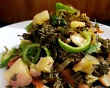 A picture of step 6 of Patoun waali Shaljum (Turnip with leaves).
