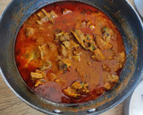A picture of step 8 of Mutton sukha and mutton curry.