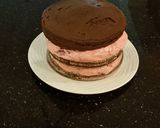 A picture of step 25 of Chocolate Layer Cake with Strawberry Cream Filling, White Chocolate Ganache Frosting coated with a Chocolate Crumble.