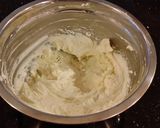 A picture of step 11 of Mint Chococolate Chip Cheesecake with a Fudge Brownie Crust.
