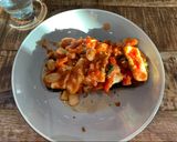 A picture of step 4 of Smokey tomato & halloumi bake.