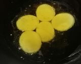 A picture of step 7 of Meethi tikkiya.