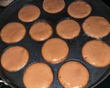 A picture of step 6 of Mini Cake Bombs.