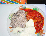 A picture of step 4 of Yam and beans with assorted meat stew.