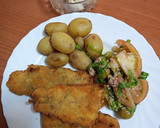 Foto del paso 3 de la receta: Merluza aromatizada de cítricos con ensalada y papas cocidas