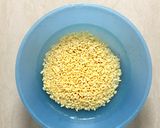 A picture of step 1 of Moong dal /skinned dal halwa.