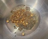 A picture of step 2 of Atukulu with coconut and cucumber in south style.