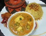A picture of step 8 of Matar Paneer with caramelized onion rice.