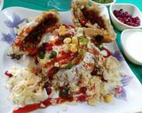 A picture of step 8 of Khasta moong daal kachori dahi chat.