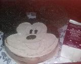 A picture of step 5 of Micky mouse chocoate cake.