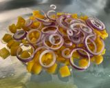 Une image de l'étape 9 de Gambas sauvages aux poivrons, oignon et citron.