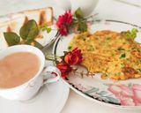A picture of step 7 of Spring Onion omellete ! Sandwich ! With hot tea ☕.