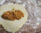 Foto del paso 6 de la receta: Empanada Venezolana de Pollo desmechado 🐔 y Salsa de Ajo 🧄🌿