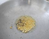 A picture of step 1 of Semolina upma.