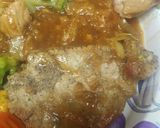 A picture of step 9 of Pork Loin in an Onion Gravy.