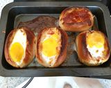 A picture of step 4 of My Cheesey Bacon & Egg in a bread basket. 😁.