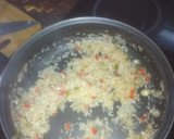 Foto del paso 1 de la receta: Arroz con bacalao, almejas y garbanzos