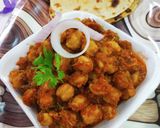 A picture of step 9 of Smoked spicy chole masala kulcha.