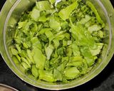 A picture of step 2 of Palak pulao.