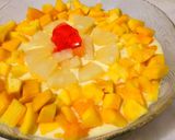 A picture of step 5 of Vanilla custard with mango pineapple,apple,banana,and jelly.