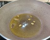 A picture of step 2 of GROUND RICE PULAO.