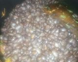 A picture of step 5 of Fried njahi (black beans).