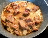 A picture of step 1 of Pork Sauté with Wine and Peppers.