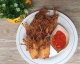 Foto langkah ke 5 dari resep Pangsit Jamur Enoki Goreng.