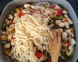 Foto del paso 7 de la receta: Espaguetis con pollo y almendras