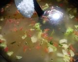 A picture of step 5 of Chicken soup with garlic bread.