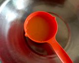 A picture of step 1 of Orange Tutti Frutti Muffins.