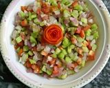 A picture of step 10 of Kachumer salad.