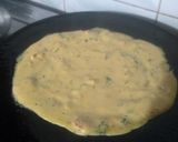 A picture of step 3 of Paneer besan ka chilla.