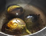 A picture of step 7 of Maharashtrian Bharli Vangi in Pressure Cooker.