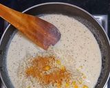 A picture of step 4 of Corn cheese pasta in peri peri white sauce.