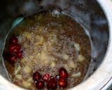 A picture of step 1 of Desi Masar and moong daal Mix on wood fire.