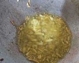 A picture of step 2 of Garlic Chicken with white sauce.