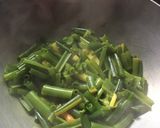 A picture of step 3 of Onion Flower Stalks dry Curry.