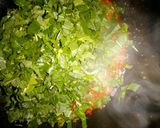 A picture of step 6 of Nigerian rice & greenish sauce.