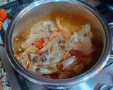 Foto del paso 14 de la receta Garbanzos y langostinos con reducción de las cabezas