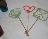A picture of step 11 of Chocolate lace lollipops.