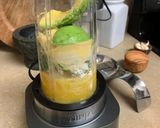 A picture of step 1 of Orange Ginger Avocado Jalapeño & Spinach Smoothie.