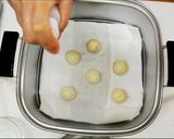 A picture of step 10 of Wagashi "Komugi-Manju" with a Fresh Herb.